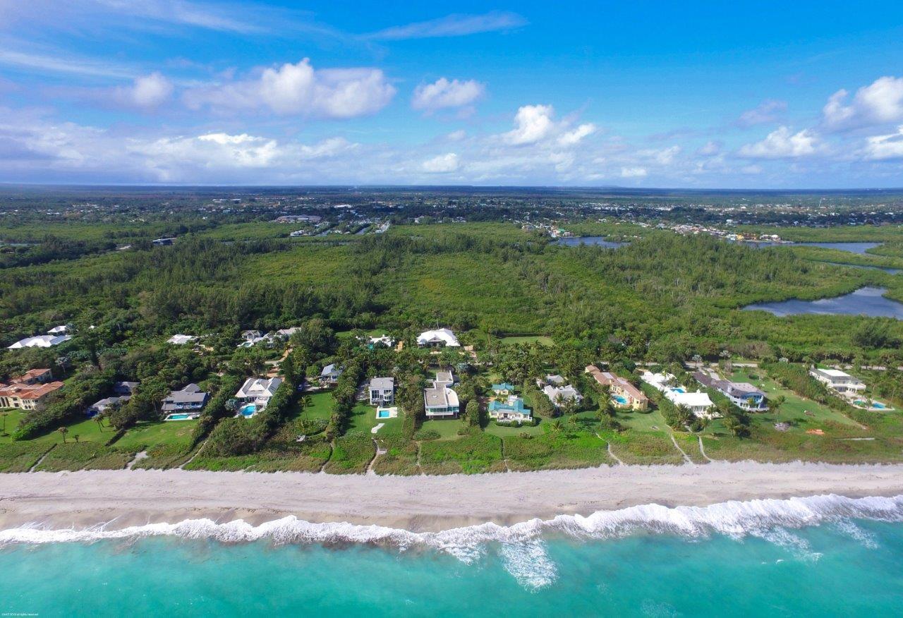 35 North Beach Road Hobe Sound, FL 33455 - Photo 2 of 44 a view of a lake with a city