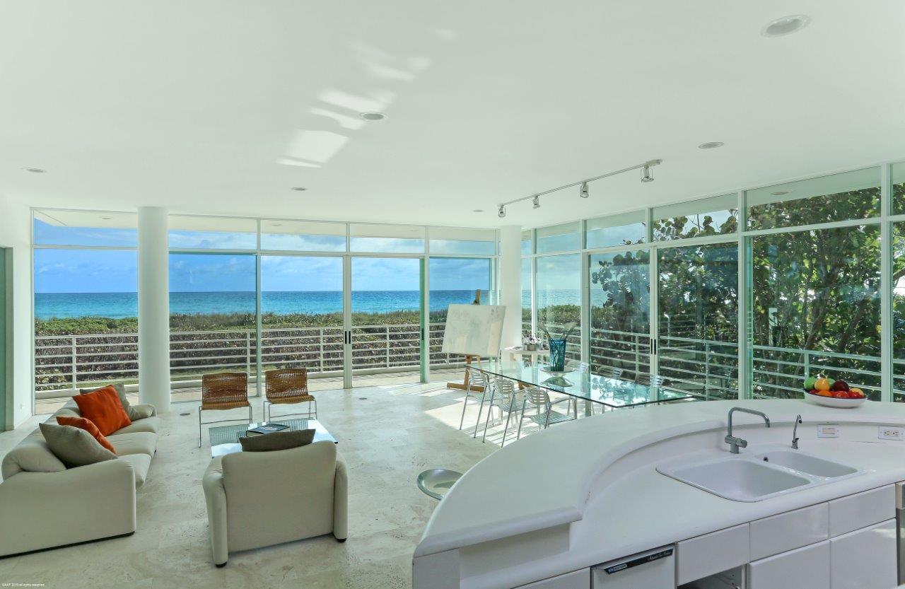 35 North Beach Road Hobe Sound, FL 33455 - Photo 21 of 44 a outdoor living space with furniture and city view