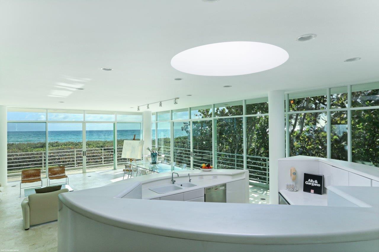 35 North Beach Road Hobe Sound, FL 33455 - Photo 23 of 44 a view of kitchen with a sink and dining table