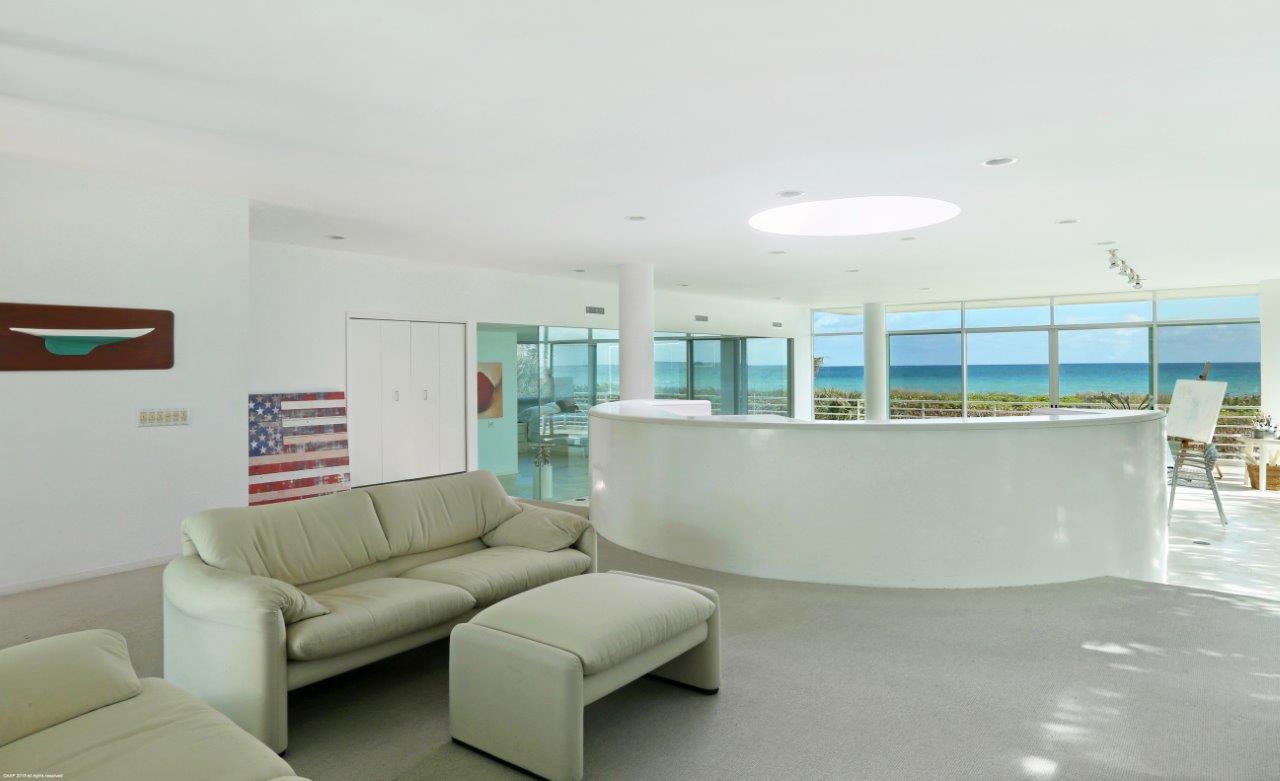 35 North Beach Road Hobe Sound, FL 33455 - Photo 24 of 44 a living room with furniture and a window