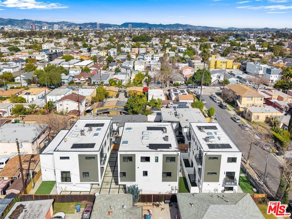 2923 South Burnside Avenue Los Angeles, CA 90016 - Photo 25 of 26 an aerial view of residential houses with city view