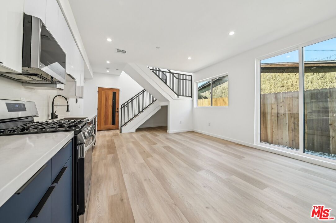 2923 South Burnside Avenue Los Angeles, CA 90016 - Photo 4 of 26 a view of a kitchen from the hallway