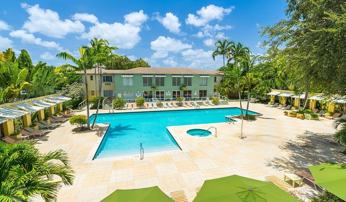 5254 Northeast 3rd Court, Unit 2 Miami, FL 33137 - Photo 11 of 11 a view of a swimming pool with a patio