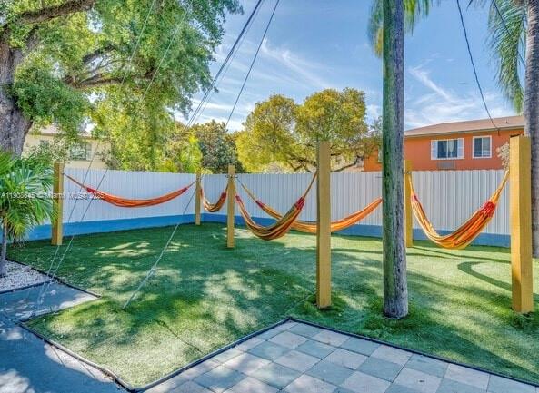 5254 Northeast 3rd Court, Unit 2 Miami, FL 33137 - Photo 2 of 11 a view of a house with a backyard