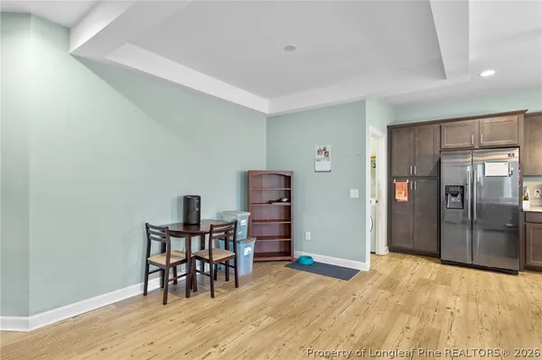 a room with furniture and wooden floor