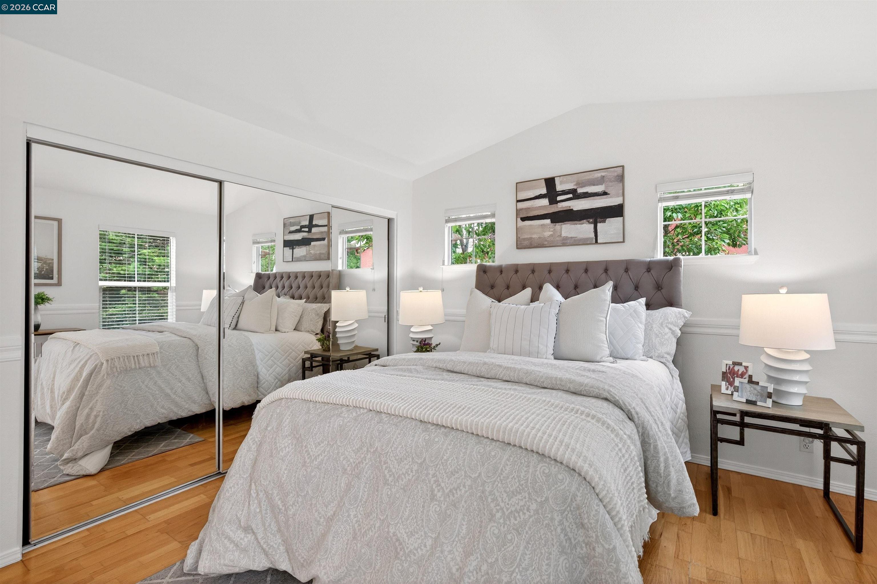 124 Coralflower Lane San Ramon, CA 94582 - Photo 16 of 47 a bedroom with two beds and painting on the wall