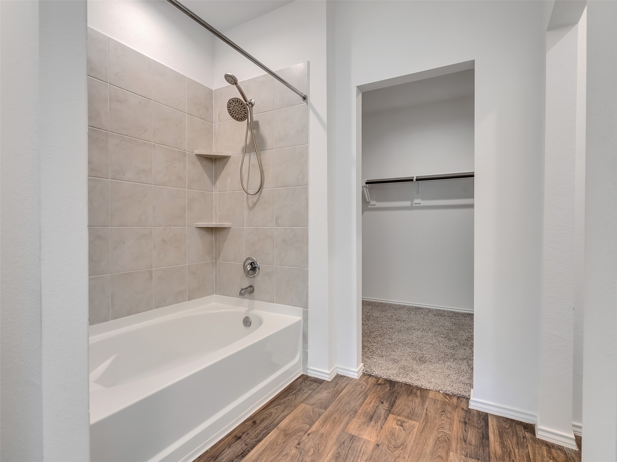 22503 Aspen Tarn Trail Spring, TX 77373 - Photo 27 of 30 a bathroom with a bathtub and shower