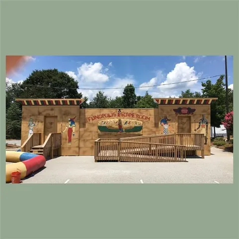 a view of a swimming pool with a yard