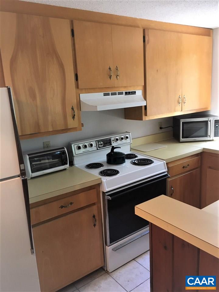 450 3 Ridges Roseland, VA 22967 - Photo 3 of 10 a kitchen with a stove and a microwave