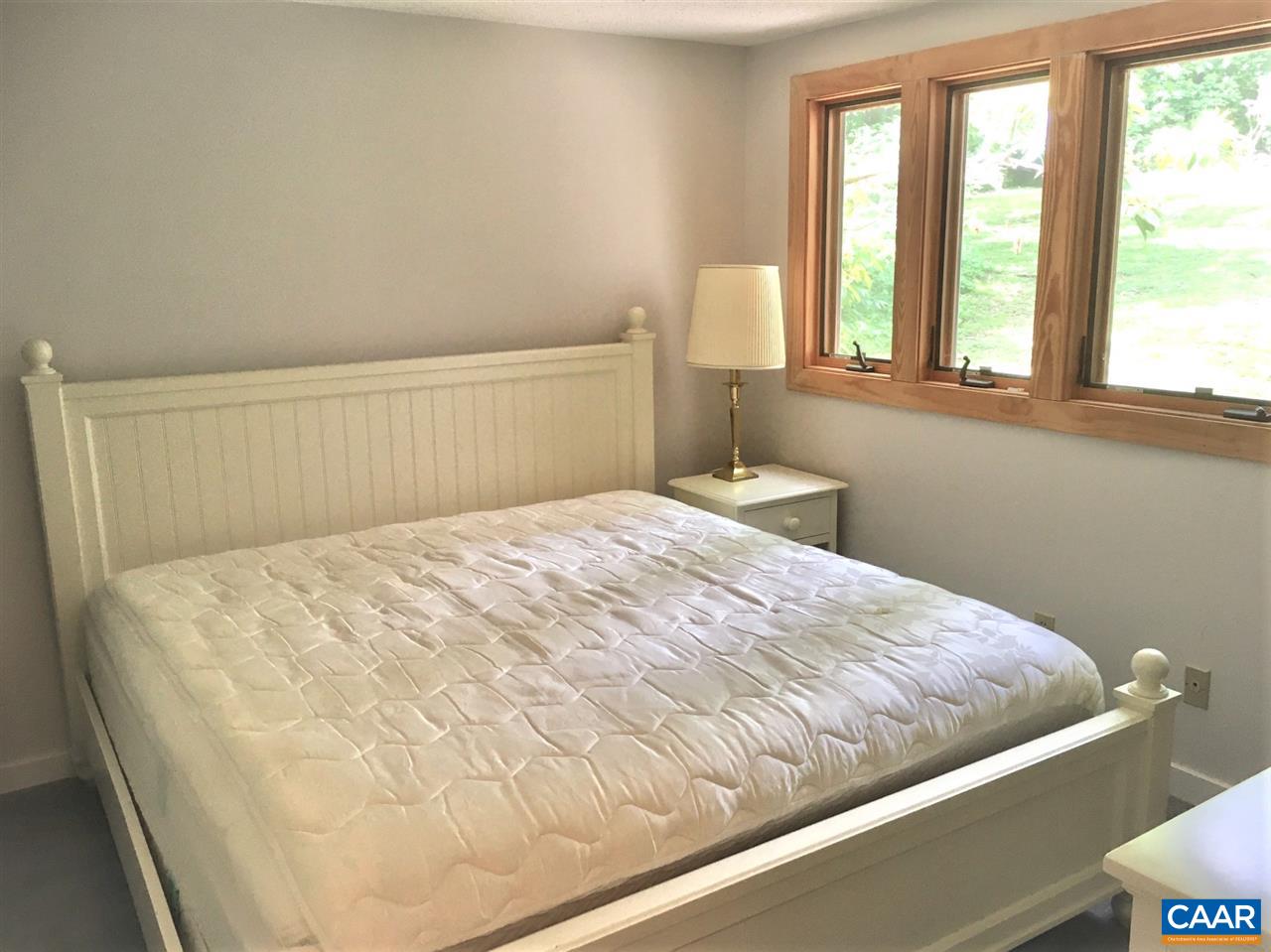 450 3 Ridges Roseland, VA 22967 - Photo 4 of 10 a bedroom with a bed and window