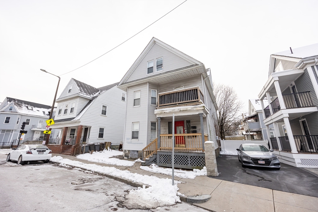 529 Adams Street, Unit 3 Boston, MA 02122 - Photo 11 of 11 a front view of a large white building