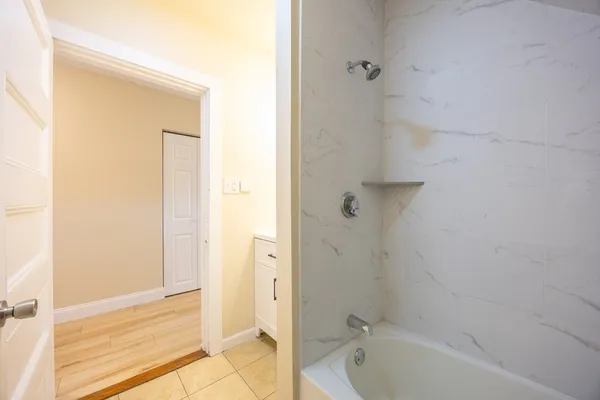 a bathroom with a bathtub