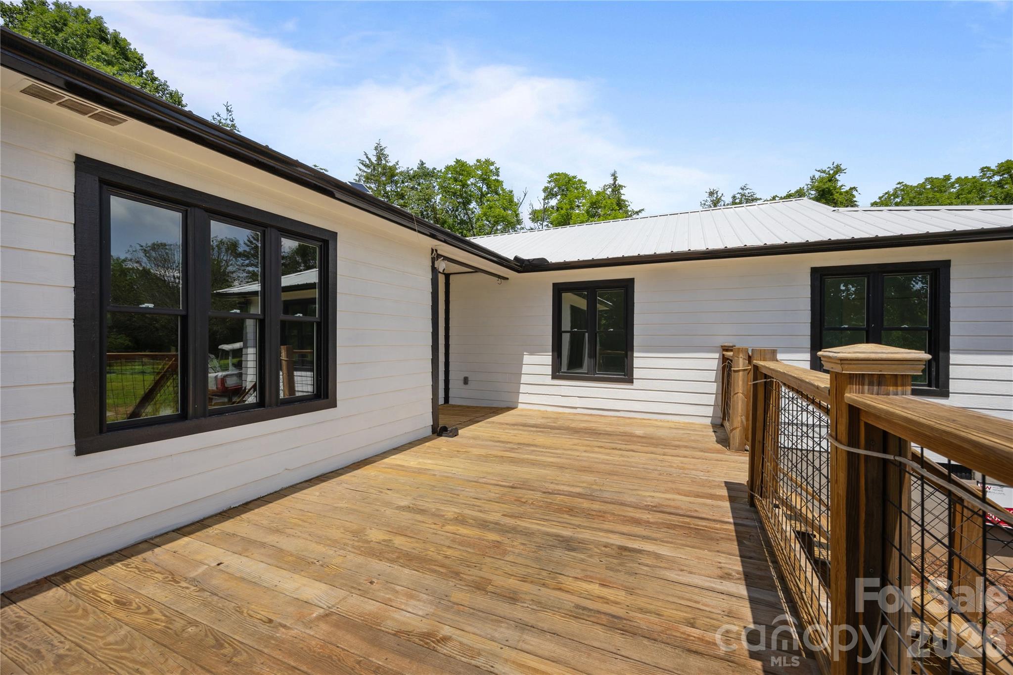 221 John C Logan Road Rutherfordton, NC 28139 - Photo 20 of 20 a view of a house with a porch