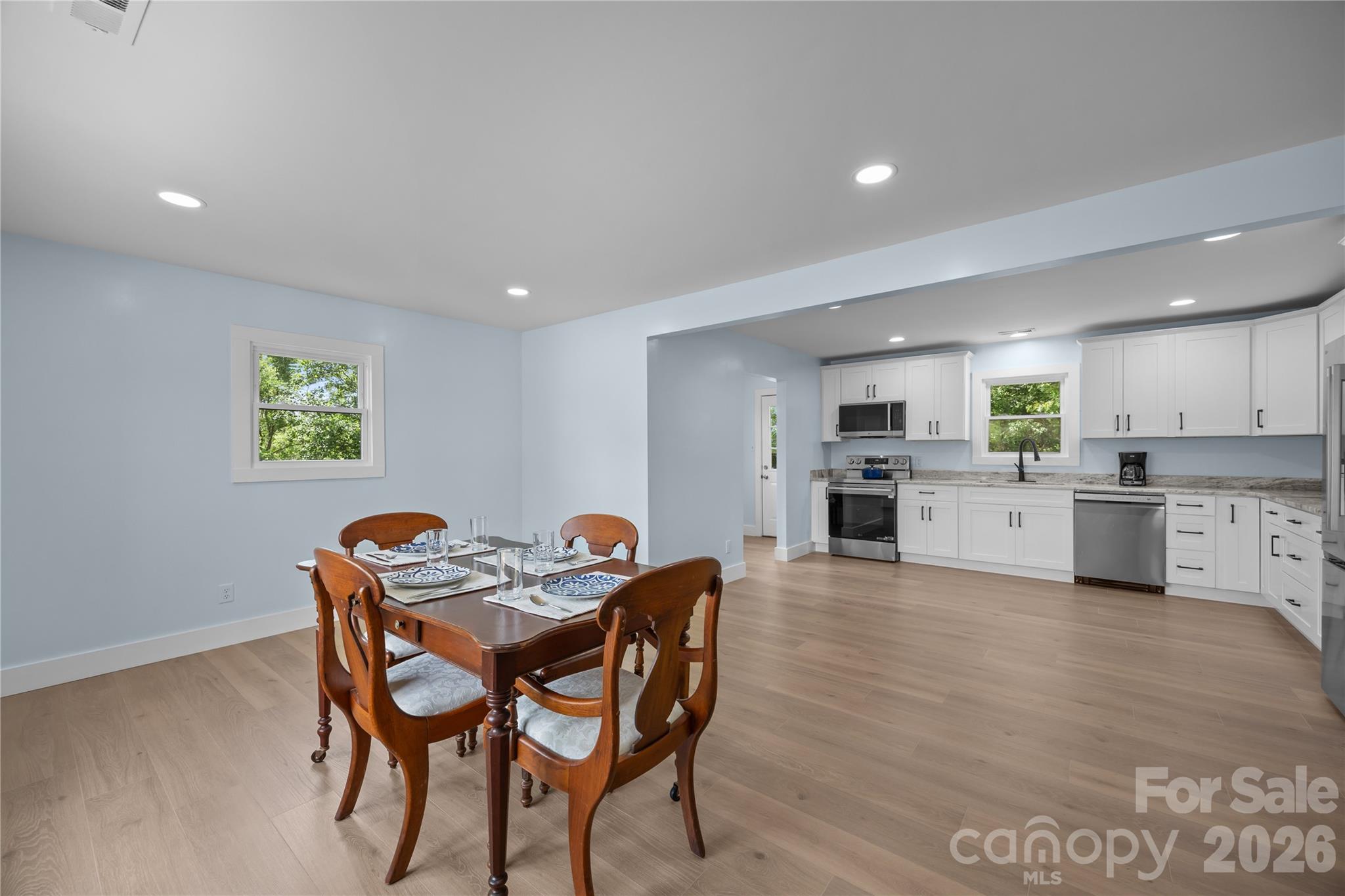 221 John C Logan Road Rutherfordton, NC 28139 - Photo 5 of 20 a view of a dining room with furniture and wooden floor