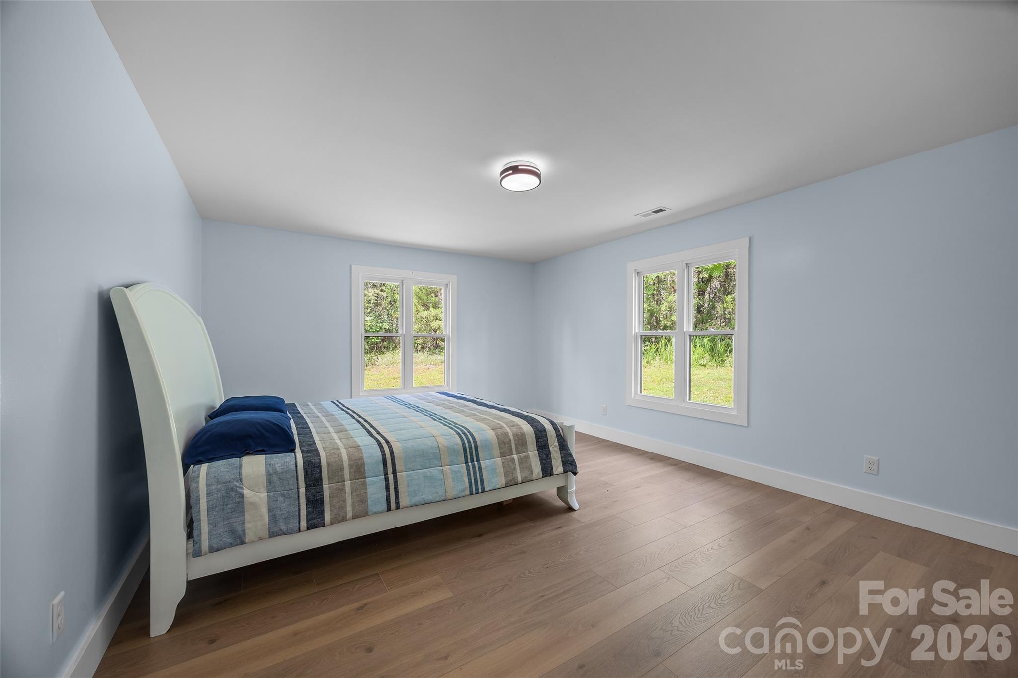 221 John C Logan Road Rutherfordton, NC 28139 - Photo 7 of 20 a bedroom with a bed and window