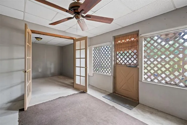 en empty room with windows