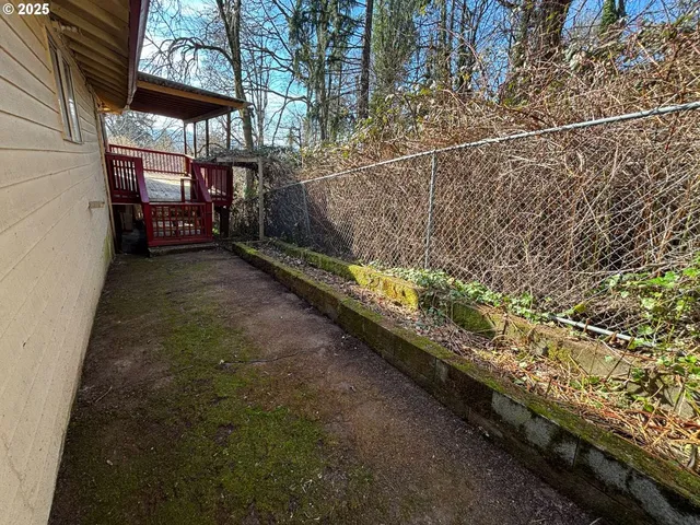 a view of a porch with wooden floor