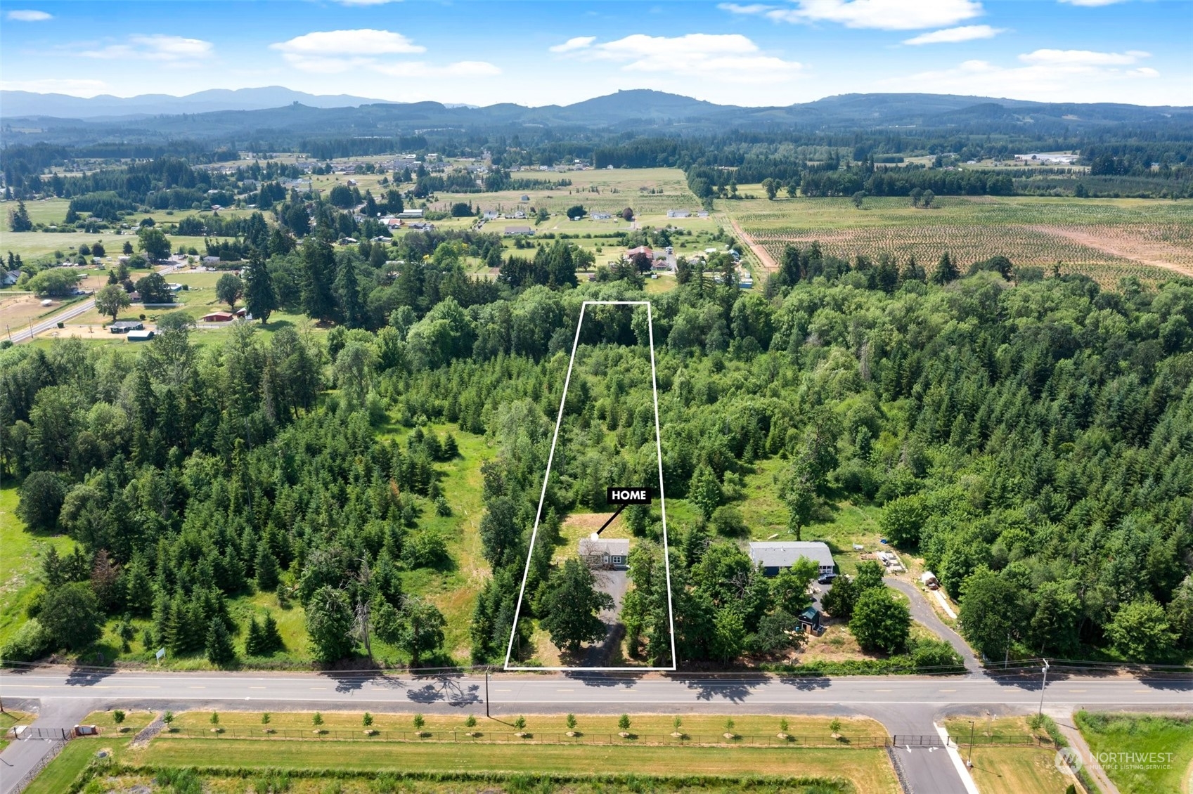 139 North Military Road Winlock, WA 98596 - Photo 10 of 40 a view of a city with mountains in the background
