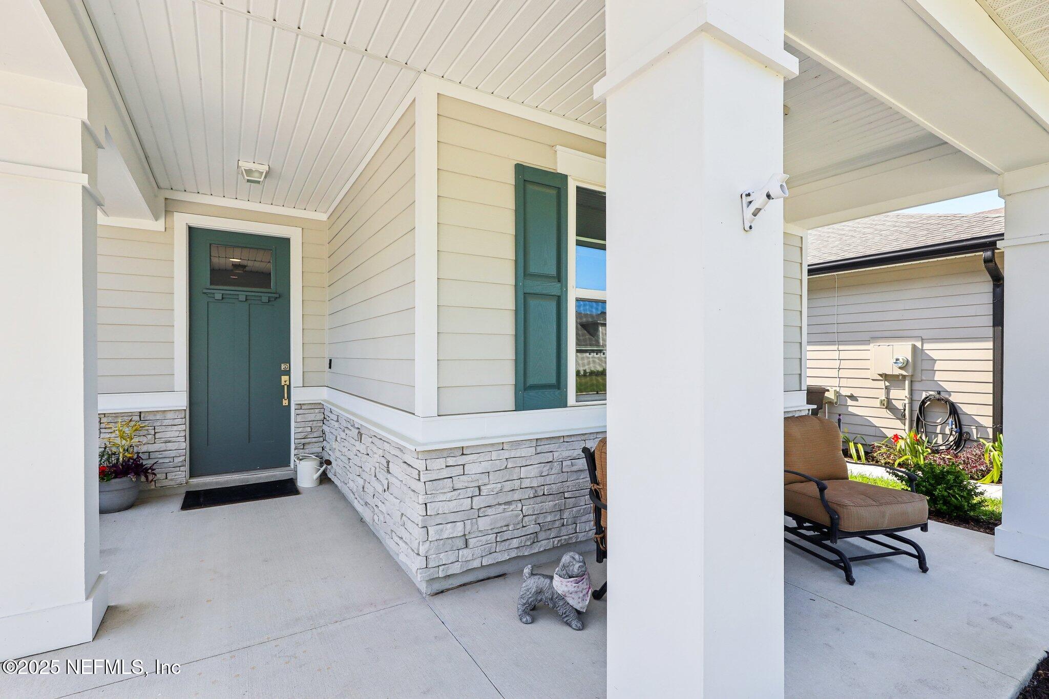 138 Wards Ravine Way St. Johns, FL 32259 - Photo 3 of 38 a view of an outdoor space with porch