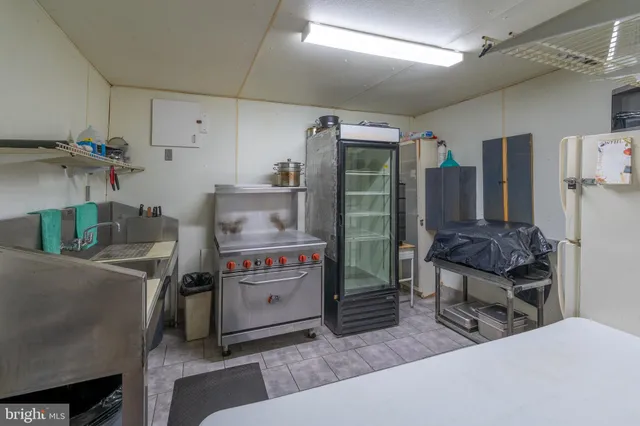 a room with a wooden floor and furniture