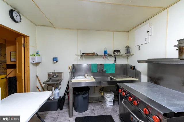 a bathroom with a sink and mirror