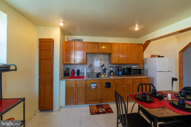 a utility room with furniture a washer and dryer