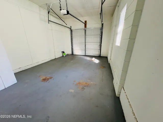 a view of a room with wooden walls