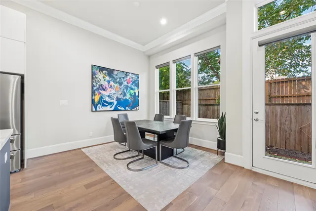 a bedroom with a large bed and a dresser