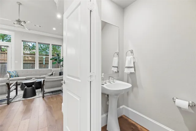 a bathroom with a large tub and shower