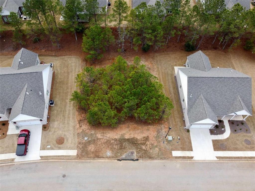 835 Crossroads Court Social Circle, GA 30025 - Photo 2 of 6 an aerial view of residential houses with outdoor space