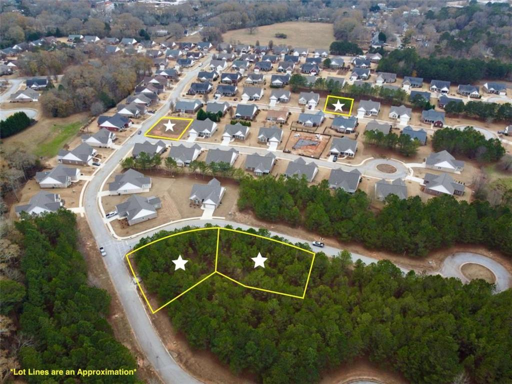 835 Crossroads Court Social Circle, GA 30025 - Photo 6 of 6 an aerial view of a house