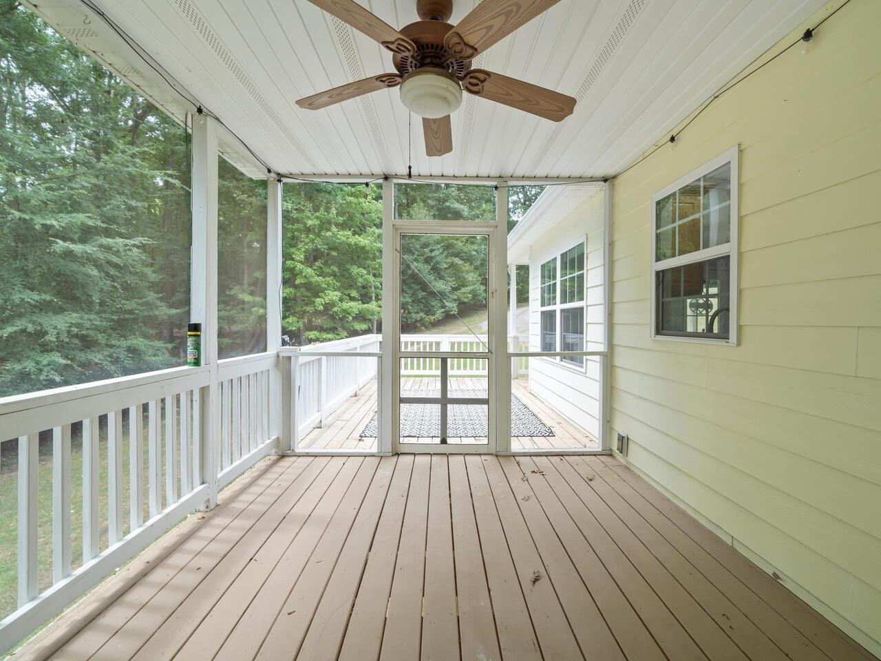 173 Briarfield Road Clarksville, VA 23927 - Photo 26 of 48 The deck opens to the Screened Room.