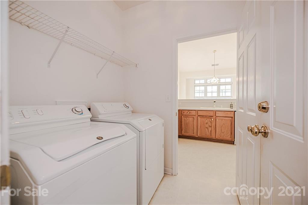 4928 Missi Lane, Unit 471 Fort Mill, SC 29708 - Photo 14 of 32 a utility room with dryer and washer