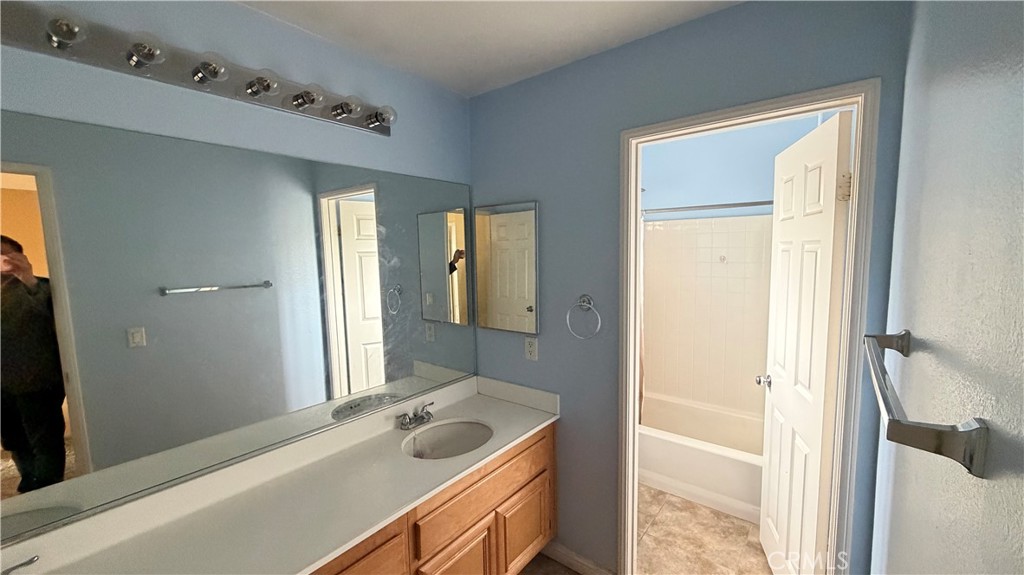 7134 Cumberland Place Rancho Cucamonga, CA 91739 - Photo 13 of 22 a bathroom with a sink and a mirror
