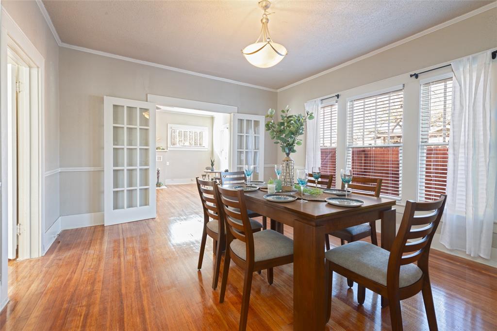 449 Clinton Street Abilene, TX 79603 - Photo 14 of 34 a view of a dining room with furniture window and wooden floor