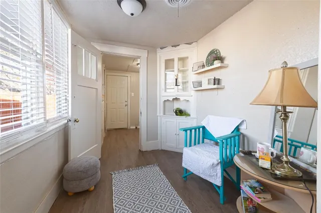 a room that has a chair and wooden floor