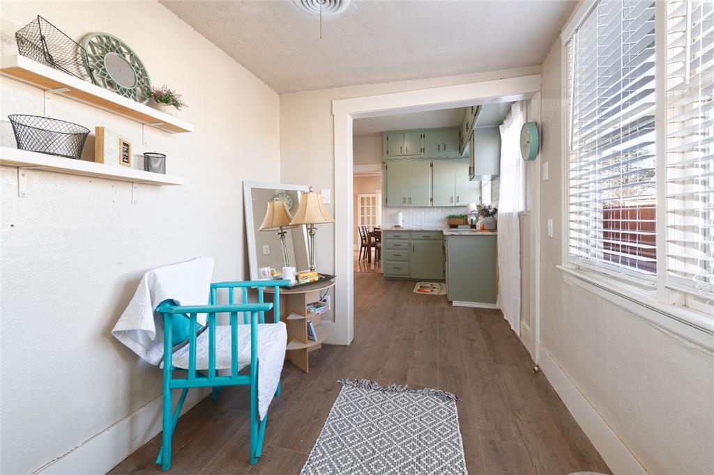 449 Clinton Street Abilene, TX 79603 - Photo 29 of 34 a dining room with furniture and wooden floor
