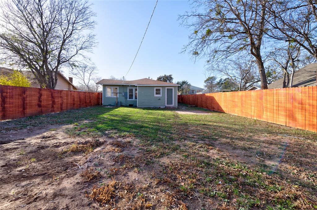 449 Clinton Street Abilene, TX 79603 - Photo 32 of 34 a view of a house with a yard