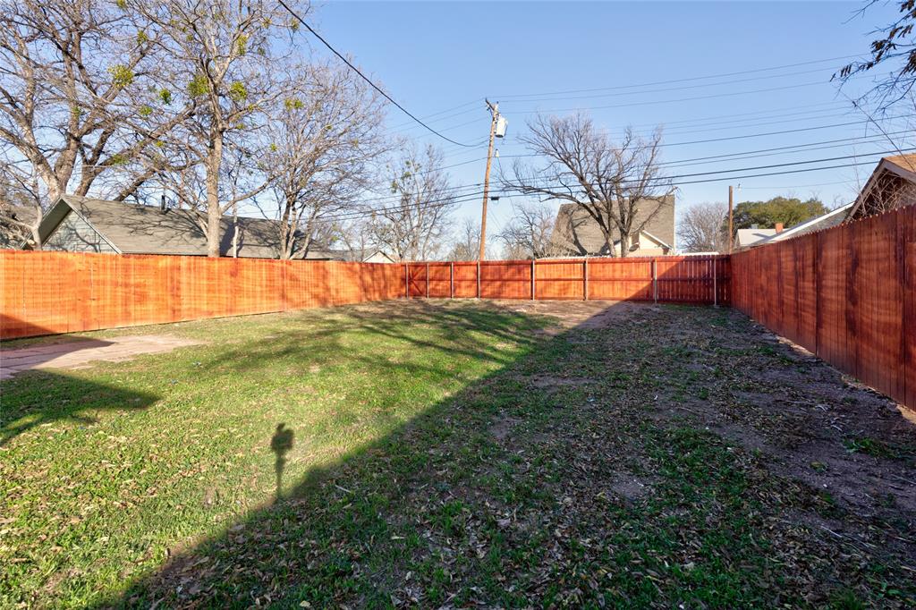 449 Clinton Street Abilene, TX 79603 - Photo 34 of 34 a view of backyard with tree