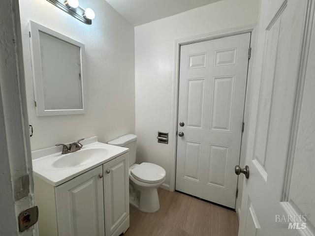 2119 Tipton Way Fairfield, CA 94533 - Photo 8 of 11 a bathroom with a sink toilet and vanity
