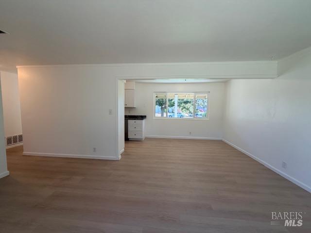 2119 Tipton Way Fairfield, CA 94533 - Photo 9 of 11 wooden floor in an empty room with a window