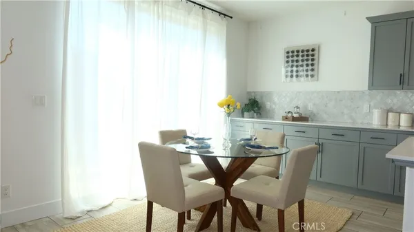 a view of a workspace with furniture