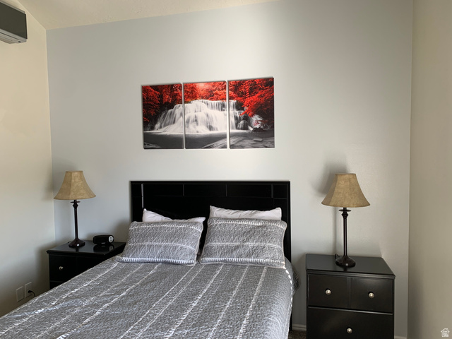 860 South Village Road, Unit B11 St. George, UT 84770 - Photo 8 of 19 Bedroom featuring a mini split for heating / cooling
