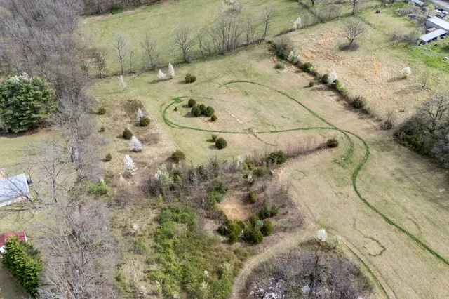 a dirty bathroom with a bathtub