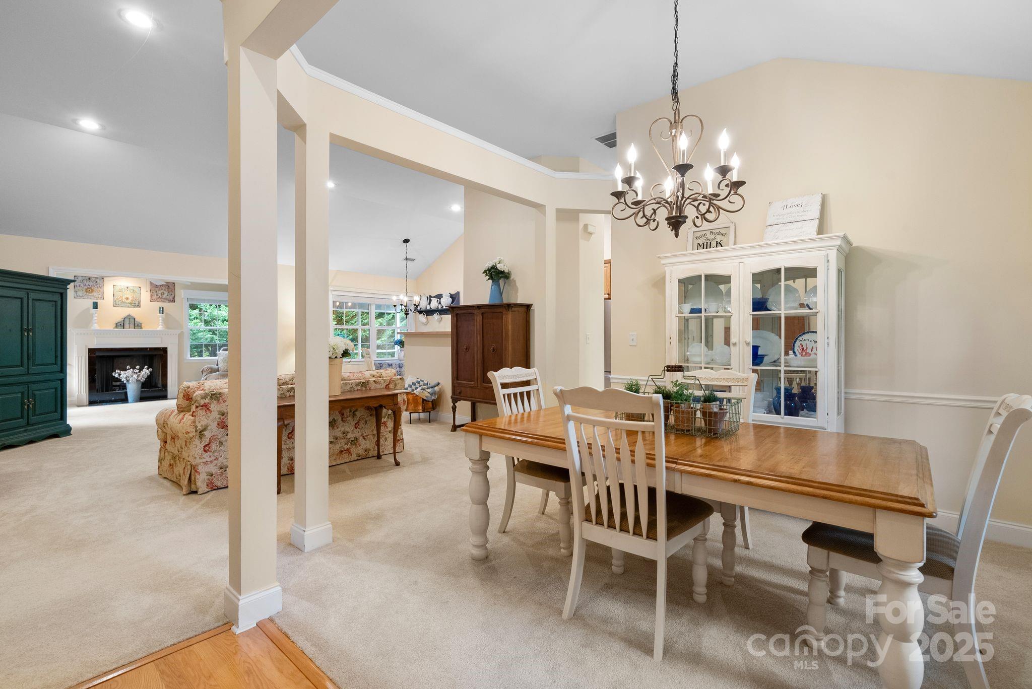50 Grove End Road Fletcher, NC 28732 - Photo 3 of 24 a view of a dining room with furniture and chandelier