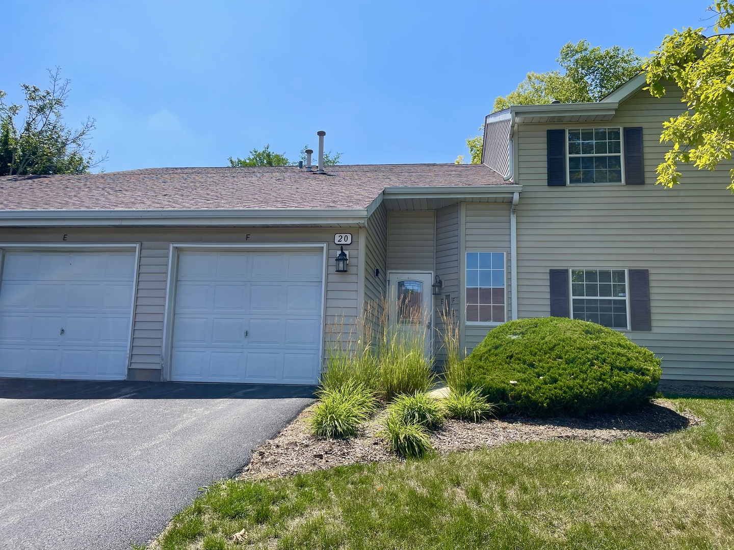 20 Gant Circle, Unit E Streamwood, IL 60107 - Photo 1 of 21 a view of a house with a garden
