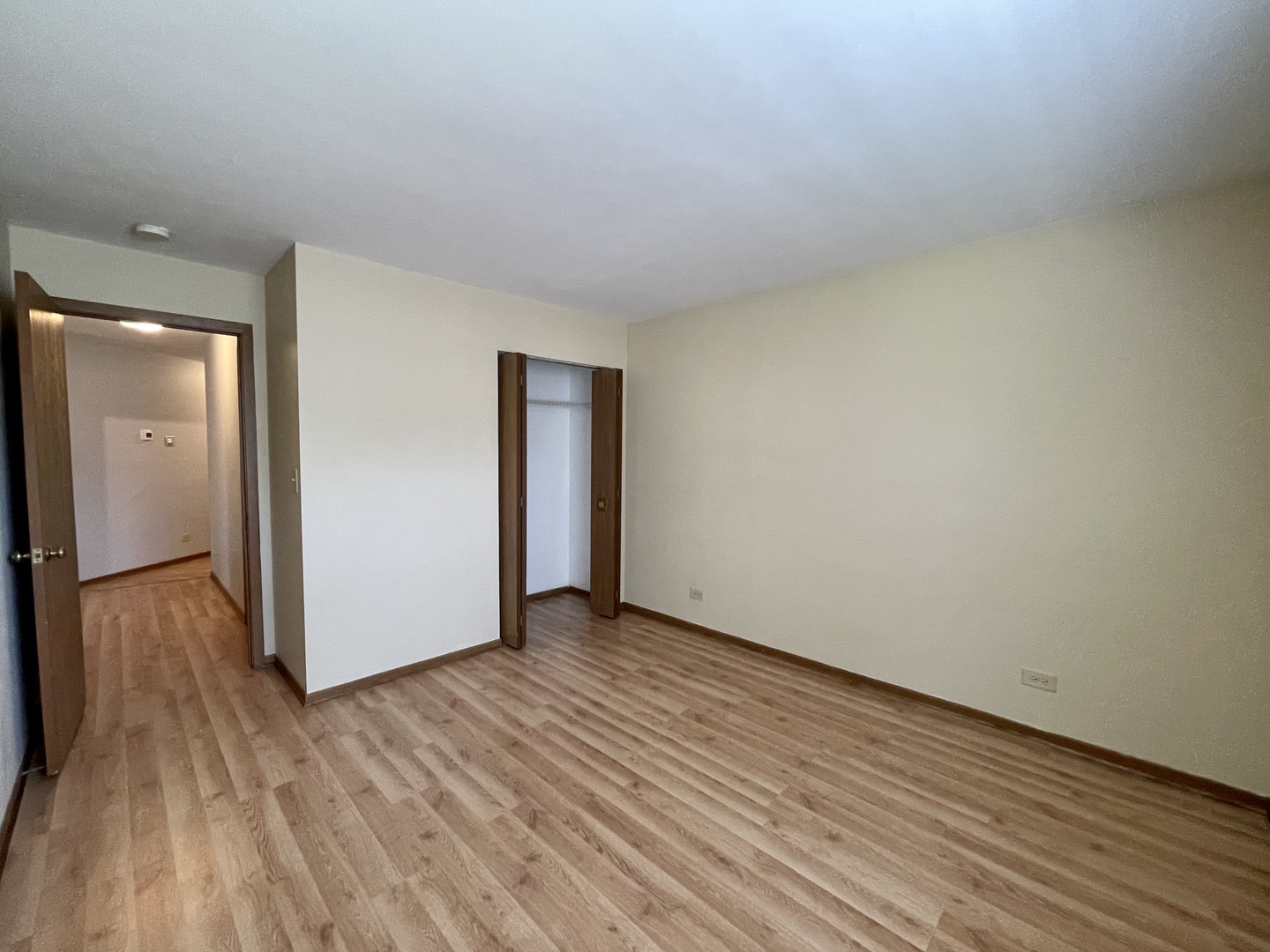 20 Gant Circle, Unit E Streamwood, IL 60107 - Photo 11 of 21 a view of an empty room and wooden floor