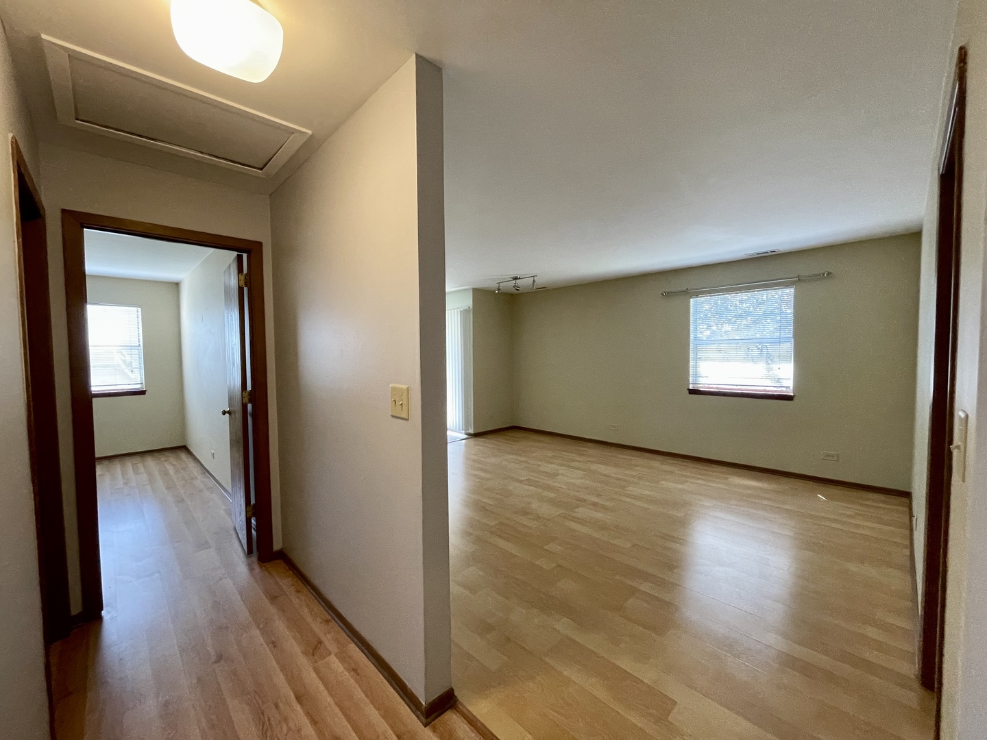 20 Gant Circle, Unit E Streamwood, IL 60107 - Photo 13 of 21 a view of a hallway with wooden floor