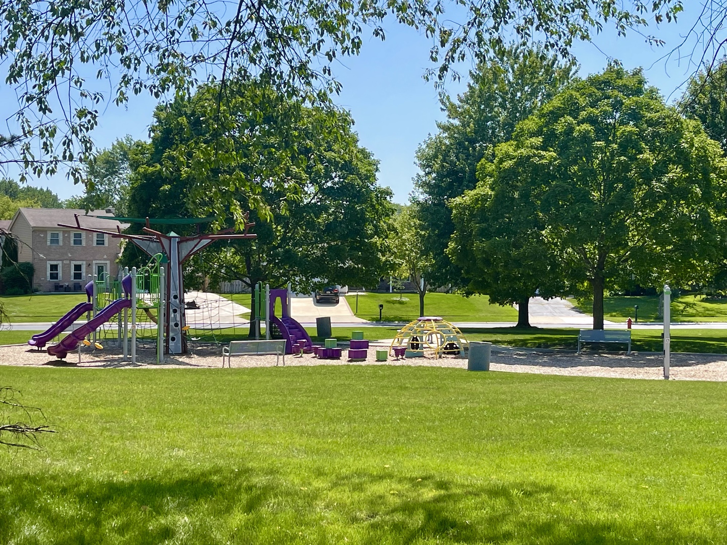20 Gant Circle, Unit E Streamwood, IL 60107 - Photo 17 of 21 a view of a park with slide and a bench