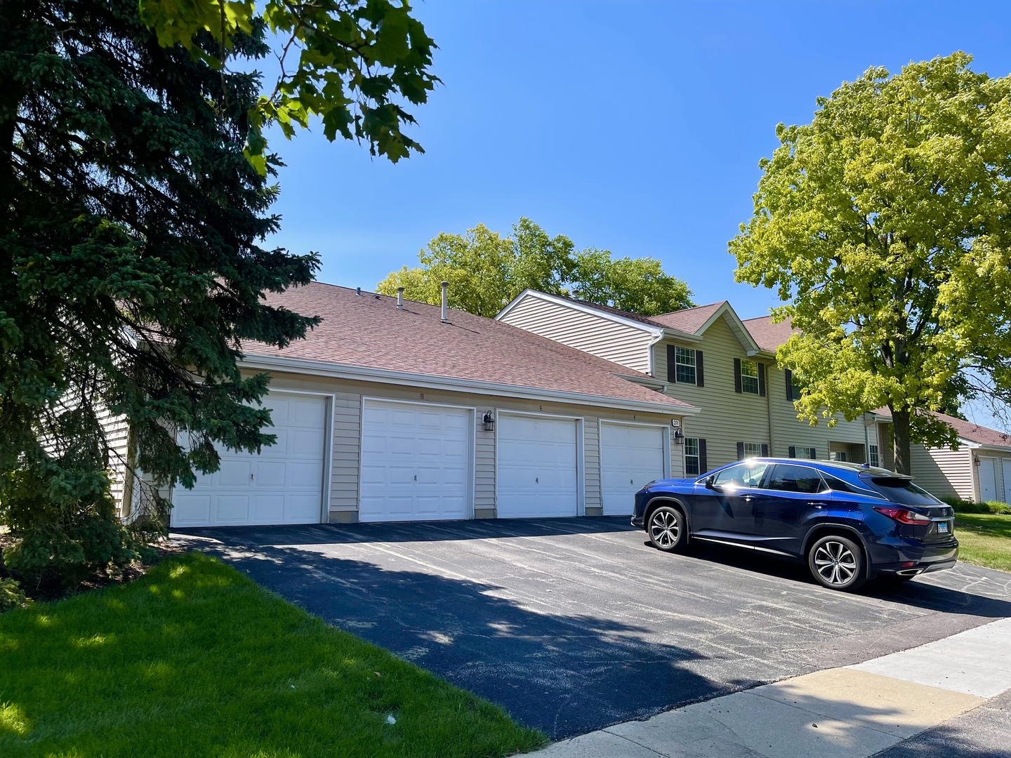 20 Gant Circle, Unit E Streamwood, IL 60107 - Photo 20 of 21 a house view with a backyard space